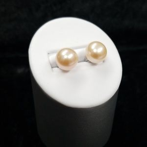Peach colored pearl earrings